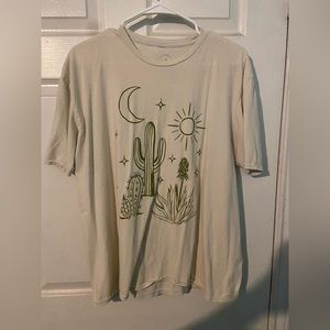 Its a medium cream shirt by pacsun